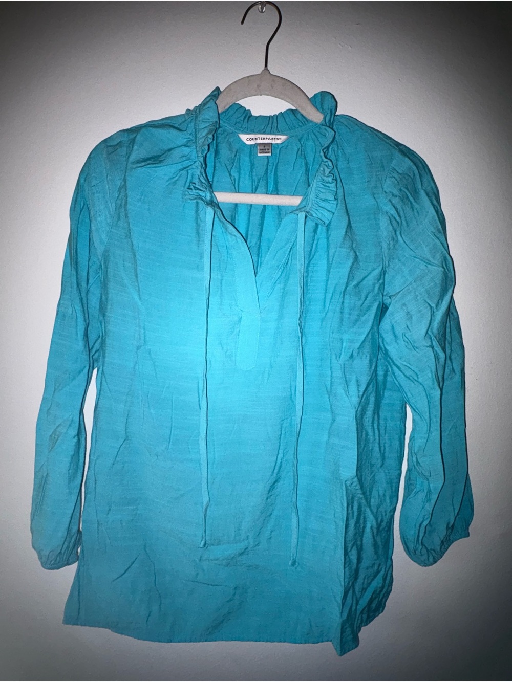 Turquoise Ruffle Tie-Neck Blouse